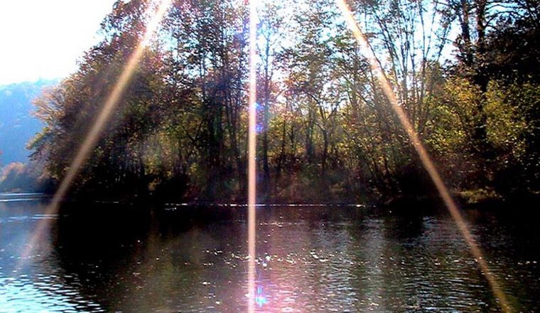 Sunburst Over River